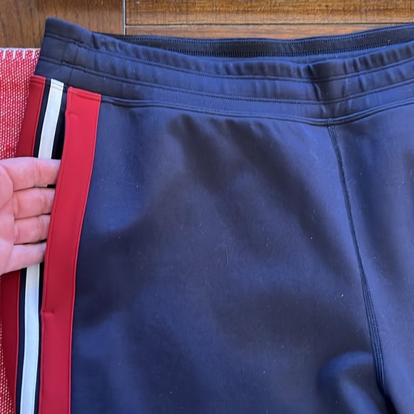 NWT Lululemon Cover your Tracks pants. Size 12. Red, white, navy blue.
LL22 - Picture 10 of 12